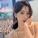 DAIIIBABYYY  -  Temperament Trendy White Bowknot Pearl Drop Dangle Earrings for Women Classic Butterfly Stud Earrings Party Jewelry Accessories