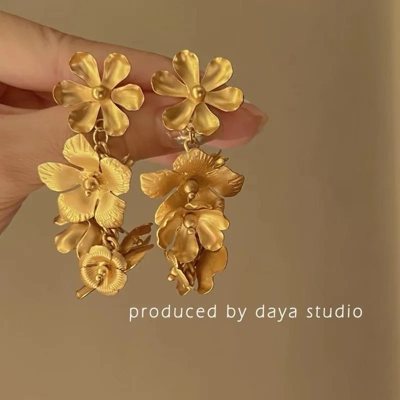 Daiiibabyyy  Exaggerated Metal Hollow Flower Drop Earrings for Women Luxury Gold Color Petal Crystal Temperament Earrings Party Jewelry
