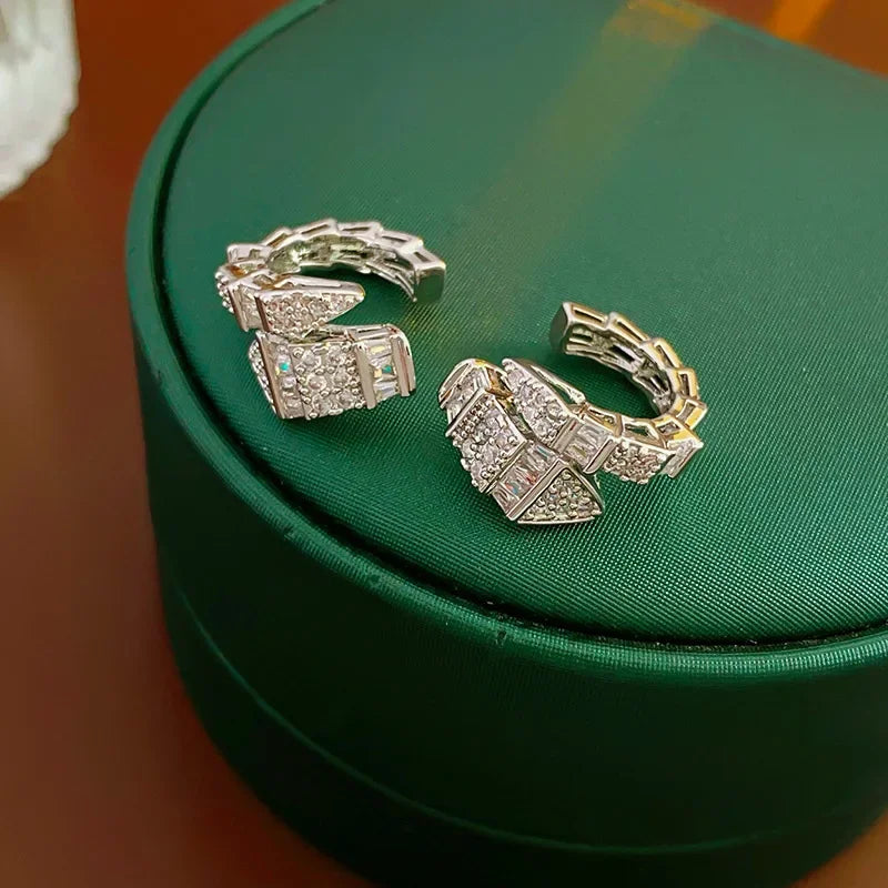 DAIIIBABYYY  -  Punk Snake C Shaped Ear Clip Earrings for Women Men Shiny Inlaid Zircon Without Piercing Earrings Ear Cuffs Party Jewelry