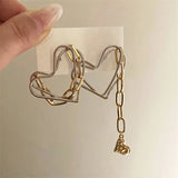 Daiiibabyyy Metallic Line Asymmetrical Love Earrings Women European American Style Hollow Heart Earrings Wedding Party Jewelry Gift