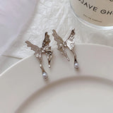 DAIIIBABYYY  -   Kpop Punk Silver Color Asymmetric Butterfly Pearl Stud Earrings Women Korean Fashion INS Cute Heart Geometric Earring