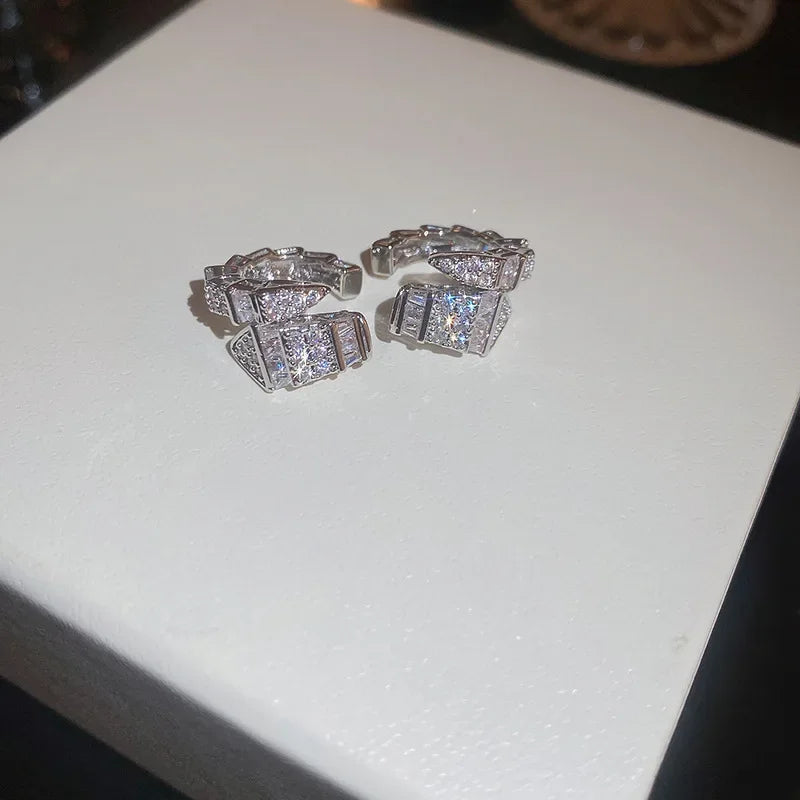 DAIIIBABYYY  -  Punk Snake C Shaped Ear Clip Earrings for Women Men Shiny Inlaid Zircon Without Piercing Earrings Ear Cuffs Party Jewelry