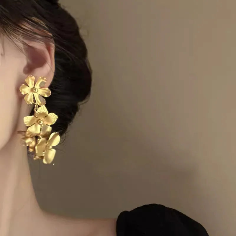Daiiibabyyy  Exaggerated Metal Hollow Flower Drop Earrings for Women Luxury Gold Color Petal Crystal Temperament Earrings Party Jewelry
