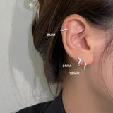 Daiiibabyyy 2PCS Stainless Steel Minimal Wave Hoop Earrings New Crystal Zirconia Small Huggie Thin Cartilage Earring Piercing Jewelry