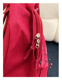Daiiibabyyy  Gothic Rock Backpack For Men And Women Large Capacity Canvas Casual Backpack With Metal & Patchwork Accents for Daily Use