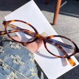 DAIIIBABYYY  -  Y2K Retro Oval Frame Glasses for Women Female Leopard Sweet Cool Eyewear Trend Reading Computer Anti Blue Light Eyeglasses