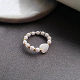 Daiiibabyyy  New Flower Acrylic Ring New Korean Style White Lily Index Finger Ring Elastic Beaded Unique Creativity Fold Women Jewelry Gifts
