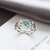 Daiiibabyyy  -  Creative Crystal Aquamarine Leaf Branch Ring for Women Fashion Design Zircon Hollowed Silver Finger Rings Jewelry Wholesale