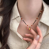 Daiiibabyyy  Creative Black Crystal Beads Rhinestone Enamel Pomegranate Pendant Necklaces for Women 18K Gold Stainless Steel Chokers