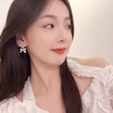 Daiiibabyyy  Korean Fashion Charm White Bowknot Stud Earring for Women Temperament Pearls Bow Heart Earrings Party Jewelry Accessories Gift
