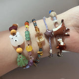 DAIIIBABYYY  -  Adjustable Cute Ceramic Beaded Charm Bracelet Christmas Santa & Tree Design for Women And Girls New Year Party Jewelry Gift
