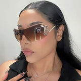 Daiiibabyyy  Cyberpunk Spicy Girl Style Retro Frameless Cut Edge Sunglasses for Women, Slim and Large Framed Snake Shaped Sunglasses