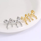 DAIIIBABYYY  -  Korean Fashion Ribbon Bow-knot Earrings for Women Cute Bow Metal Stud Earring Girls Charm Wedding Party Jewelry Gift
