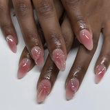 Daiiibabyyy  24pcs Pink Almond Sweet Fake Nails 3D Transparent Bowknots Love Heart Decor Press On Nails Shiny Cat's Eye Gradient False Nail