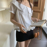 DAIIIBABYYY  -  2025 Korean Chic Summer New Style Romantic Texture Temperament Off Shoulder Ruffle Edge Short Sleeved Shirt Top