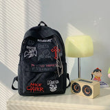 Daiiibabyyy  Gothic Rock Backpack For Men And Women Large Capacity Canvas Casual Backpack With Metal & Patchwork Accents for Daily Use