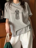 DAIIIBABYYY  -  Korean 2025 Circle Haired Puppy Letter Printed Short Sleeved T-shirt Women Summer New Design Niche Loose Top