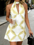 Daiiibabyyy  Women’s White Sleeveless Halter Mini Dress Featuring Yellow Abstract Leaf Motif, Deep V-Cut Neckline, Casual Summer Vacation