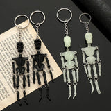 Daiiibabyyy  1pcs Creative Skull Shaking Skeleton Luminous Keychain Men and Women Key Ring Pendant Halloween Fashion Jewelry Gifts