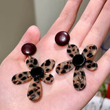 Leopard print holiday flower earrings