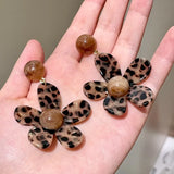 Leopard print holiday flower earrings