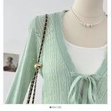 DAIIIBABYYY  -  Vacation Style Hollow Hook Flower Trumpet Sleeve V-neck Knitted Sweater Summer Bow Tie Single Breasted Mid Length Top