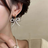 Daiiibabyyy  Korean White Imitation Pearl Bow Dangle Earrings for Women Elegant Handmade Woven Beaded Earrings Wedding Y2K Jewelry