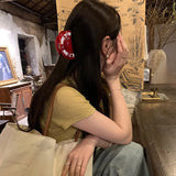 Daiiibabyyy  1pc Cherry style scratch clip with a minimalist and high-end feel, featuring a shark shaped hair clip at the back of the head