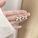 Daiiibabyyy  Korean Fashion Charm White Bowknot Stud Earring for Women Temperament Pearls Bow Heart Earrings Party Jewelry Accessories Gift