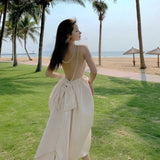 DAIIIBABYYY  -  Super Fairy Sexy Sanya Beach Resort Party Skirt Women Elegant Pearl Backless Bow Dress Summer Holiday Apricot Glossy Midi Dress