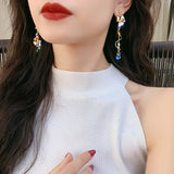 Daiiibabyyy  New Trendy Cute Flower Asymmetrical Spiral Dangle Earrings for Women Charm Long Tassel Blue Crystal Drop Earring Wedding Jewelry