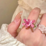 Daiiibabyyy  New Flower Acrylic Ring New Korean Style White Lily Index Finger Ring Elastic Beaded Unique Creativity Fold Women Jewelry Gifts