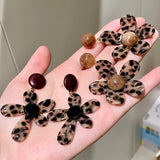 Leopard print holiday flower earrings