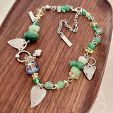 Irregular green crushed stone crystal heart multi-element stitching necklace