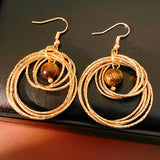 Daiiibabyyy  New Maillard Retro Tiger Eye Stone Round Hollow Earrings Elegant All-match Luxury High Grade Earrings For Women