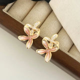 Daiiibabyyy  Tibetan Silver Gold Plated Enamel Flower Plant Stud Earring for Women Cute Fashion Jewelry Light Luxury Accessories