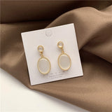 Daiiibabyyy New Korea Oval White Woman Jewelry Eardrop Earrings Cat's Eye Stone Moonlight