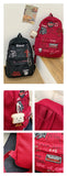 Daiiibabyyy  Gothic Rock Backpack For Men And Women Large Capacity Canvas Casual Backpack With Metal & Patchwork Accents for Daily Use