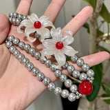 DAIIIBABYYY  -  Acrylic white flower bead necklace