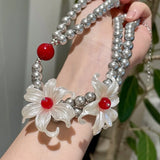 DAIIIBABYYY  -  Acrylic white flower bead necklace