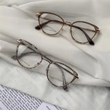Daiiibabyyy   -  New Fashion Anti Blue Light Glasses High-end Women Men Cat Eyes Glasses Protective Glasses Retro Metal Frames Eyewear