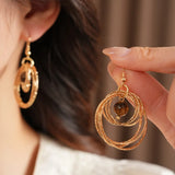 Daiiibabyyy  New Maillard Retro Tiger Eye Stone Round Hollow Earrings Elegant All-match Luxury High Grade Earrings For Women