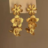 Daiiibabyyy  Exaggerated Metal Hollow Flower Drop Earrings for Women Luxury Gold Color Petal Crystal Temperament Earrings Party Jewelry