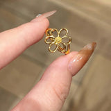 Daiiibabyyy  Fashion Metal Hollow Daisy Flower Open Rings For Women Simple Gold Color Adjustable Finger Rings Jewelry Accessories