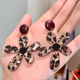 Leopard print holiday flower earrings