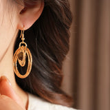 Daiiibabyyy  New Maillard Retro Tiger Eye Stone Round Hollow Earrings Elegant All-match Luxury High Grade Earrings For Women