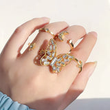 DAIIIBABYYY  -  Bohemian Gold Color Butterfly Rings Set For Women Fashion Shiny Crystal Geometric Flower Knuckle Finger Ring Jewelry Adjustable