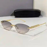 Daiiibabyyy  Retro Frameless Trimmed Cat Eye Rivet Small Frame Sunglasses for Men and Women Round Face Slimming Hip-hop Trampoline Sunglasses