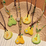 Daiiibabyyy  Ceramic fruit skin rope pendant with adjustable necklace