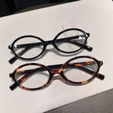 DAIIIBABYYY  -  Y2K Girls Retro Oval Frame Glasses Women Female Leopard Cool Eyewear Trend Brand Reading Computer Anti Blue Light Eyeglasses